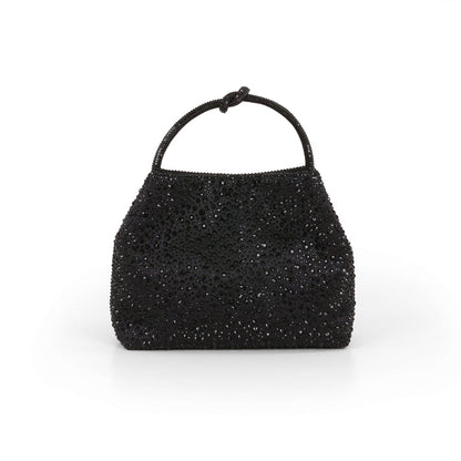 Black beaded handbag on a white background