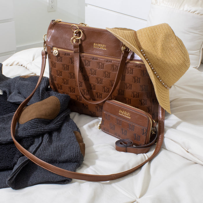 Brown Madalyn Vegan Leather Pouch Belt Bag with weekend bag